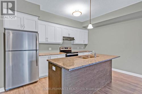 118 - 25 Isherwood Avenue, Cambridge, ON - Indoor Photo Showing Kitchen With Stainless Steel Kitchen With Double Sink