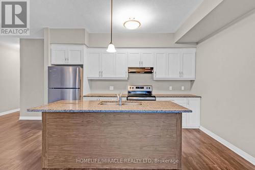 118 - 25 Isherwood Avenue, Cambridge, ON - Indoor Photo Showing Kitchen With Stainless Steel Kitchen