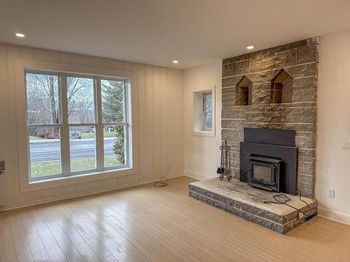 Living room - 138 Rue Principale, Grenville, QC - Indoor Photo Showing Living Room With Fireplace