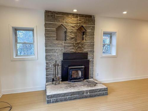 Living room - 138 Rue Principale, Grenville, QC - Indoor Photo Showing Living Room With Fireplace