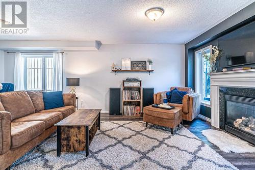 8 Fallingbrook Crescent, Kawartha Lakes (Lindsay), ON - Indoor Photo Showing Living Room With Fireplace