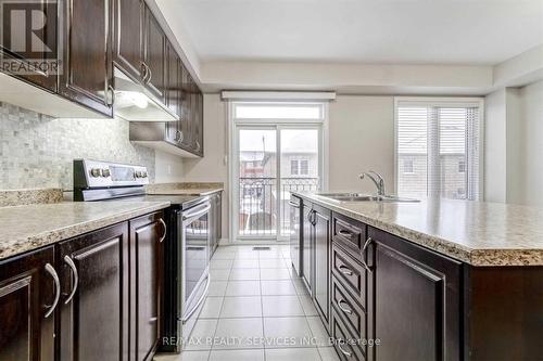 128 Sea Drifter Crescent, Brampton, ON - Indoor Photo Showing Kitchen With Double Sink