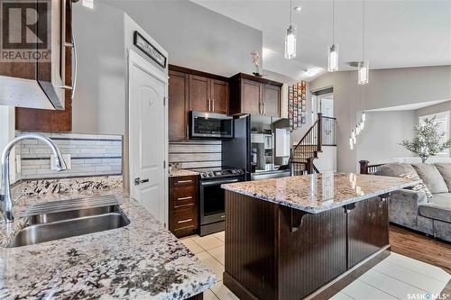 1231 Hargreaves Way, Saskatoon, SK - Indoor Photo Showing Kitchen With Double Sink With Upgraded Kitchen