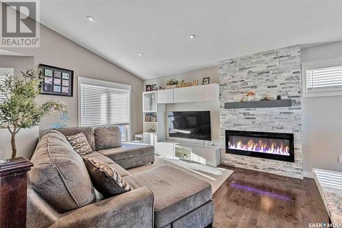 1231 Hargreaves Way, Saskatoon, SK - Indoor Photo Showing Living Room With Fireplace