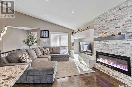 1231 Hargreaves Way, Saskatoon, SK - Indoor Photo Showing Living Room With Fireplace