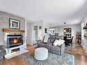 Salon - 202-869 Rue Albert-Beaulieu, Joliette, QC  - Indoor Photo Showing Living Room With Fireplace 