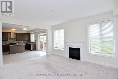 7724 Black Maple Drive, Niagara Falls, ON - Indoor Photo Showing Living Room With Fireplace