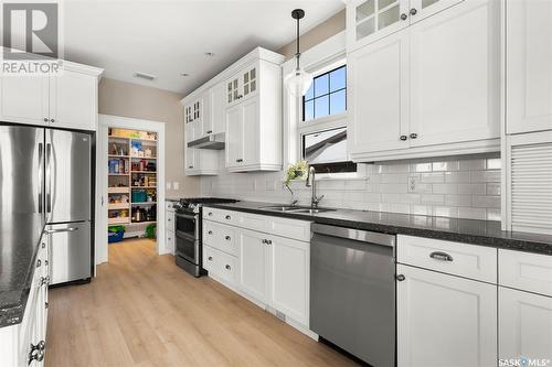 52 Fairway Crescent, White City, SK - Indoor Photo Showing Kitchen With Stainless Steel Kitchen With Double Sink