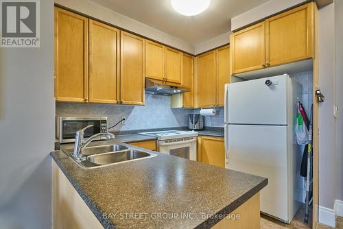 1114 - 3880 Duke Of York Boulevard, Mississauga, ON - Indoor Photo Showing Kitchen With Double Sink