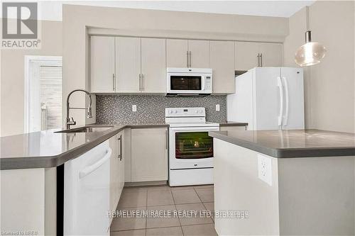 59 - 515 Winston Rd Road, Grimsby, ON - Indoor Photo Showing Kitchen