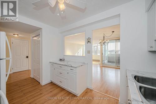 305 - 30 Harrisford Street, Hamilton, ON - Indoor Photo Showing Kitchen With Double Sink