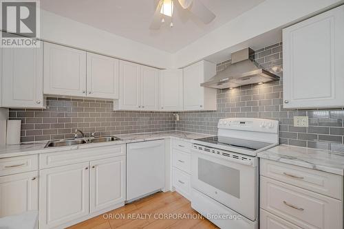 305 - 30 Harrisford Street, Hamilton, ON - Indoor Photo Showing Kitchen With Double Sink