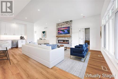 6755 Shaker Lane, Plympton-Wyoming, ON - Indoor Photo Showing Living Room With Fireplace