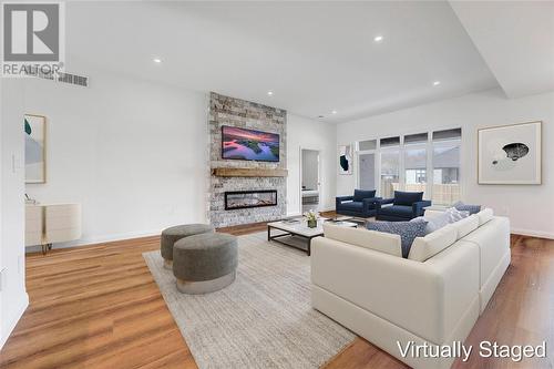 6755 Shaker Lane, Plympton-Wyoming, ON - Indoor Photo Showing Living Room With Fireplace