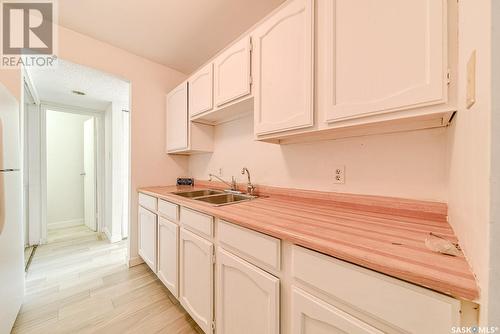 5040 10Th Avenue, Regina, SK - Indoor Photo Showing Kitchen With Double Sink