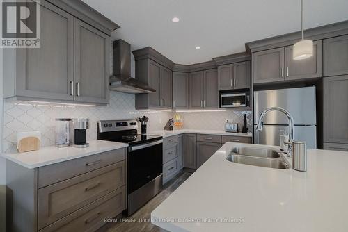 1056 Meadowlark Ridge, London, ON - Indoor Photo Showing Kitchen With Double Sink With Upgraded Kitchen