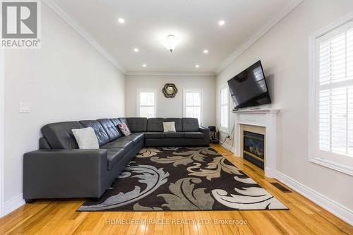 23 Brentcliff Drive, Brampton, ON - Indoor Photo Showing Living Room With Fireplace