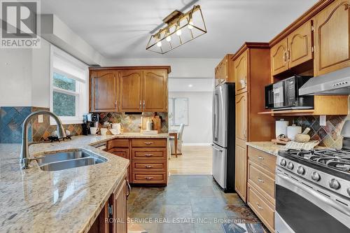 7634 Langstaff Road, Clarington, ON - Indoor Photo Showing Kitchen With Double Sink