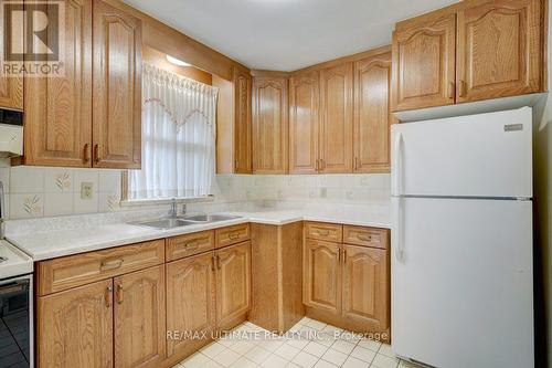 111 Rexleigh Drive, Toronto, ON - Indoor Photo Showing Kitchen With Double Sink