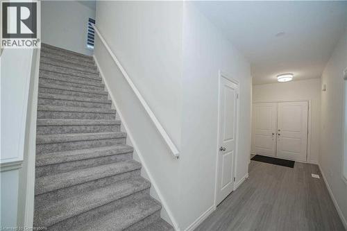 Stairway featuring hardwood / wood-style flooring - 182 Byers Street, London, ON - Indoor Photo Showing Other Room