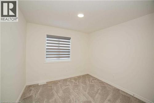 View of carpeted spare room - 182 Byers Street, London, ON - Indoor Photo Showing Other Room