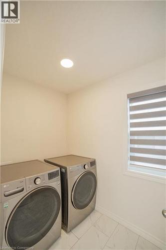 Laundry room featuring separate washer and dryer - 182 Byers Street, London, ON - Indoor Photo Showing Laundry Room