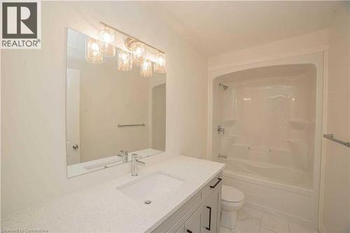 Full bathroom featuring shower / tub combination, vanity, and toilet - 182 Byers Street, London, ON - Indoor Photo Showing Bathroom