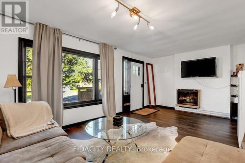 66 Withrow Avenue, Ottawa, ON - Indoor Photo Showing Living Room With Fireplace