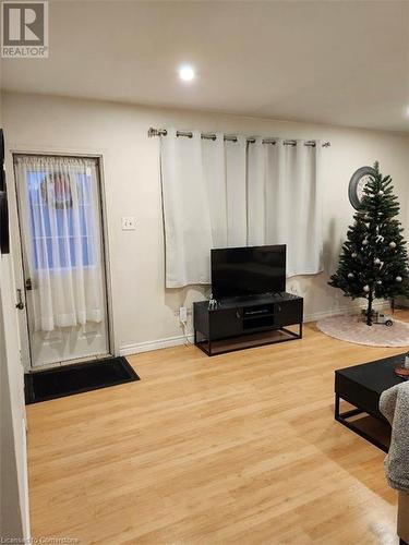 Living room featuring light hardwood / wood-style floors - 744-746 Queen Street S, Kitchener, ON - Indoor