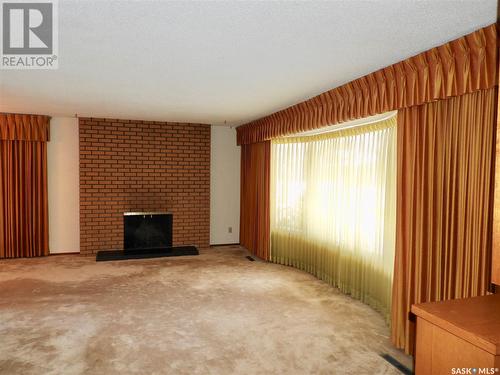 30 Deborah Crescent, Saskatoon, SK - Indoor Photo Showing Living Room With Fireplace