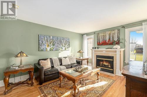 14 Garrison Drive, North Grenville, ON - Indoor Photo Showing Living Room With Fireplace