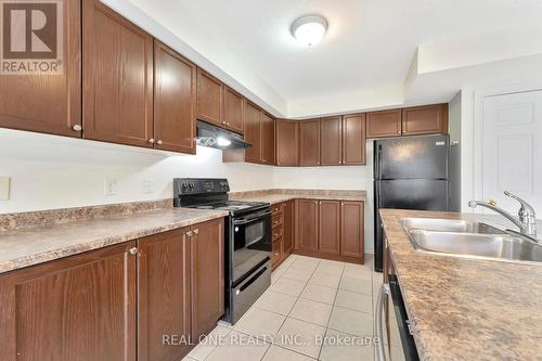 A - 104 Norma Crescent, Guelph, ON - Indoor Photo Showing Kitchen With Double Sink