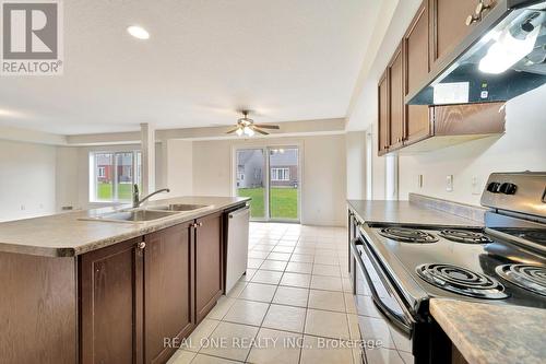 A - 104 Norma Crescent, Guelph, ON - Indoor Photo Showing Kitchen With Double Sink