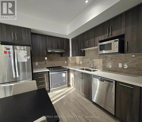 D305 - 33 Clegg Road, Markham, ON - Indoor Photo Showing Kitchen With Double Sink With Upgraded Kitchen