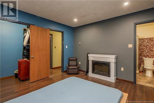 2999 Red Head, Saint John, NB - Indoor Photo Showing Bedroom With Fireplace