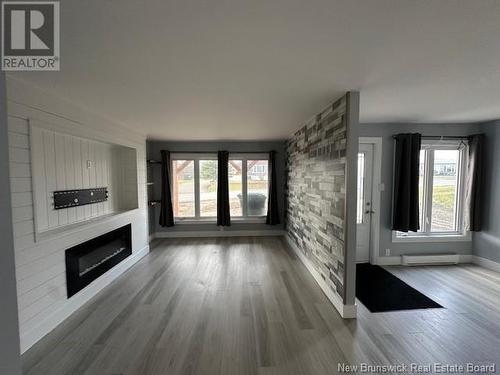 383 Rue Principale Street, Eel River Crossing, NB - Indoor Photo Showing Living Room With Fireplace