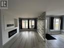 383 Rue Principale Street, Eel River Crossing, NB  - Indoor Photo Showing Living Room With Fireplace 