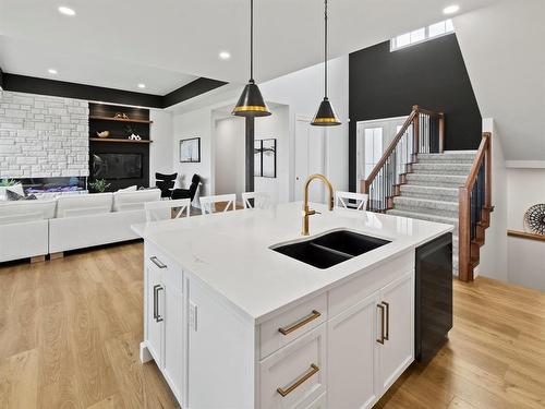 6 Ammeter Bay, Headingley, MB - Indoor Photo Showing Kitchen With Double Sink