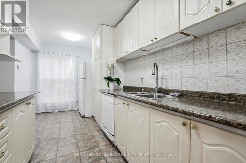 124 - 70 Cass Avenue, Toronto, ON - Indoor Photo Showing Kitchen With Double Sink