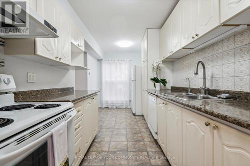 124 - 70 Cass Avenue, Toronto, ON - Indoor Photo Showing Kitchen With Double Sink