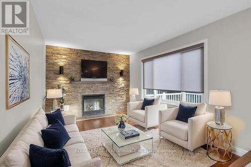 32 Rideaucrest Drive, Ottawa, ON - Indoor Photo Showing Living Room With Fireplace