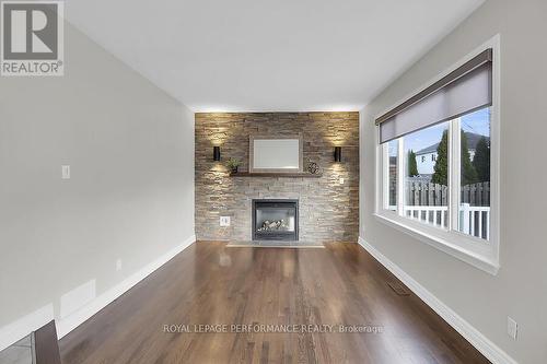 32 Rideaucrest Drive, Ottawa, ON - Indoor Photo Showing Living Room With Fireplace