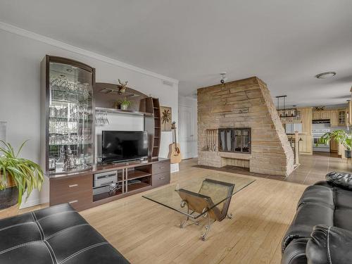 Living room - 621 Rue Hector-Fabre, Lévis (Desjardins), QC - Indoor Photo Showing Living Room With Fireplace