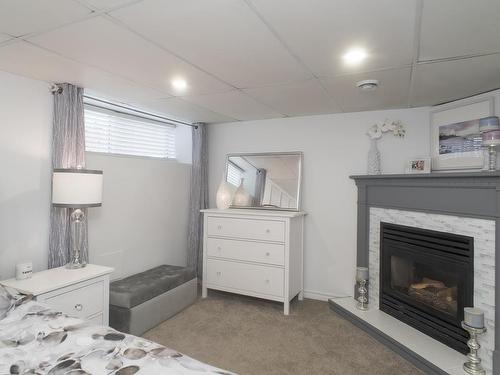 1319 Ford Street, Thunder Bay, ON - Indoor Photo Showing Bedroom With Fireplace