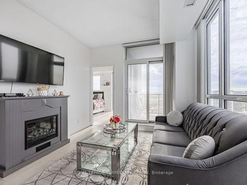 607-15 Zorra St, Toronto, ON - Indoor Photo Showing Living Room With Fireplace