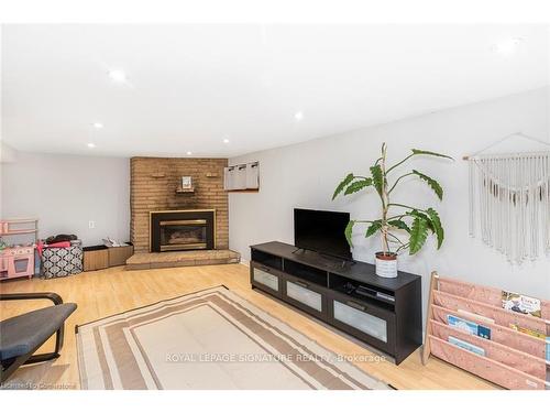 62 East 14Th St, Hamilton, ON - Indoor Photo Showing Living Room With Fireplace