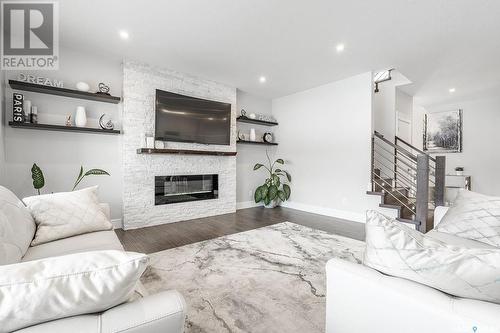 515 Kenaschuk Way, Saskatoon, SK - Indoor Photo Showing Living Room With Fireplace