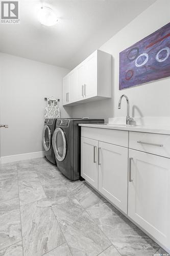 515 Kenaschuk Way, Saskatoon, SK - Indoor Photo Showing Laundry Room