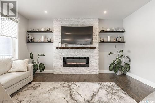 515 Kenaschuk Way, Saskatoon, SK - Indoor Photo Showing Living Room With Fireplace