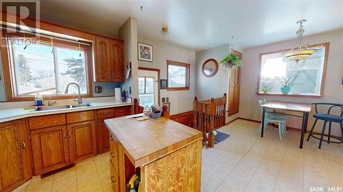 821 5Th Avenue Nw, Moose Jaw, SK - Indoor Photo Showing Kitchen With Double Sink